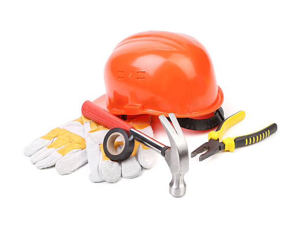 istock Hard hat, hammer, pliers and work gloves. 485113563