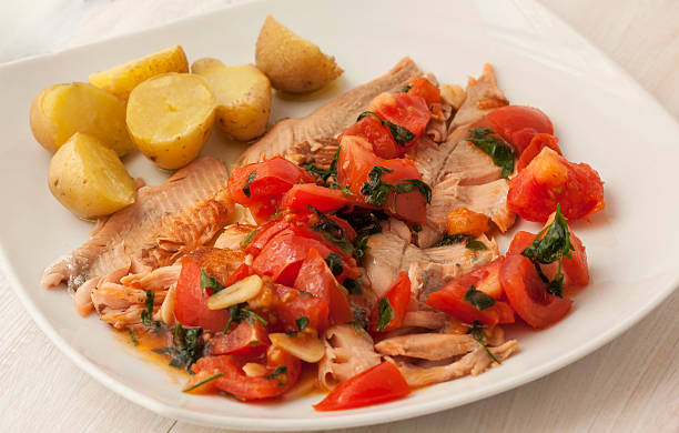 istock Tasty healthy fish fillet with vegetables 485115439