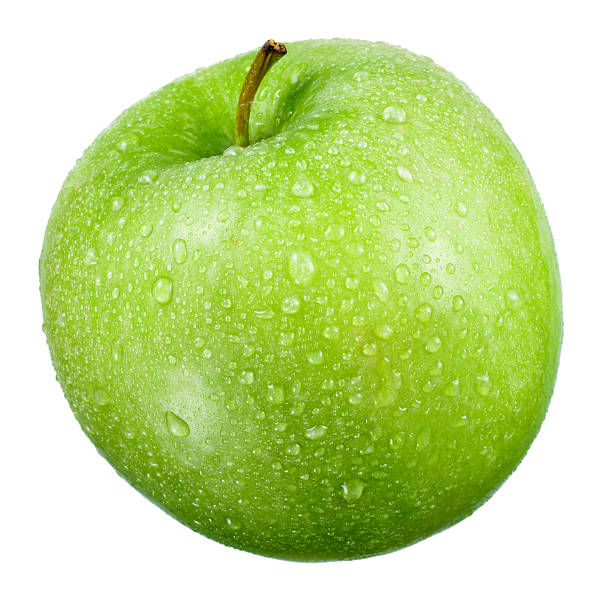 зеленое яблоко с каплями изолирован на белом - wet apple стоковые фото и изображения