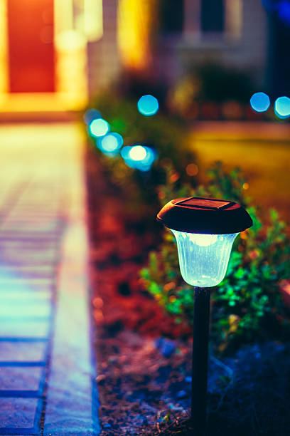 istock Small Solar Garden Light, Lantern In Flower Bed. Garden Design. 485116942