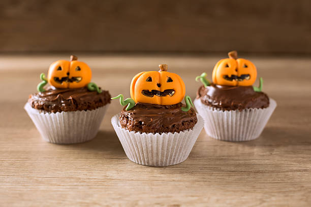 istock Homemade Jack O'lantern Pumpkin cupcakes 485116972
