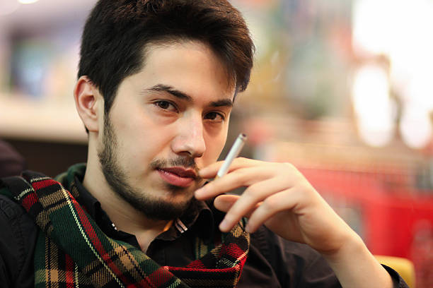 istock The boy smoking indoor 485117298