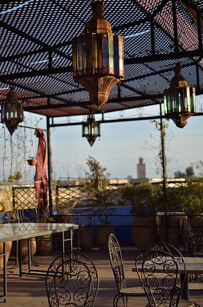 Good morning Marrakesh Marrakesh. Breakfast time with a view at the city from a local riad's rooftop terrace.  marrakesh riad stock pictures, royalty-free photos & images