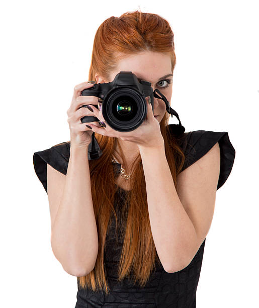istock Young woman taking a photo 485117623
