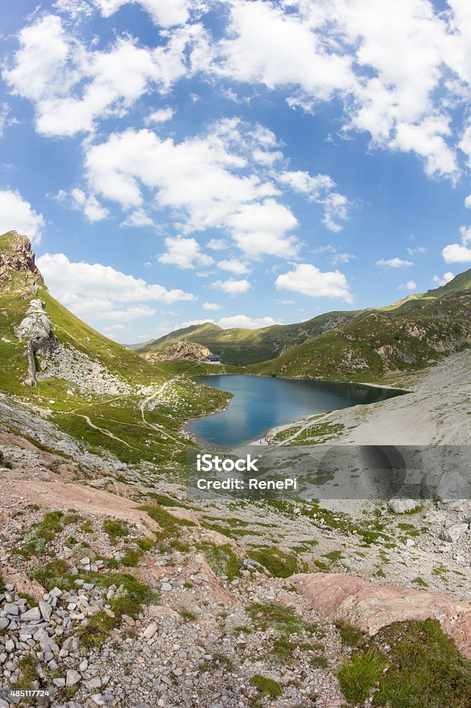 Lake Wolayersee In Lesachtal Taken on August 13th, 2015 - As the weather couldn't be more perfect and it's been pretty hot down in the valley I went on a hiking tour early in the morning. Started at 7:30 am at the Hubertuskapelle in Nostra Lesachtal and reached my goal at 2.000m Lake Wolayersee at 10 am. It's close to the austrian-italian border and in times of heat still fresh and clear water to cool down a little. 2015 Stock Photo