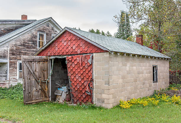 istock Abandoned American Midwest Farm House and Garage 485117802
