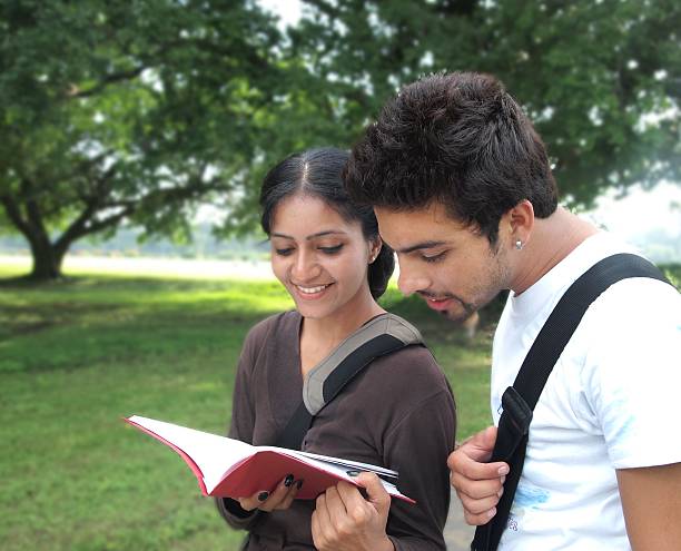 istock Two Indian college friends discussing a topic. 485118113