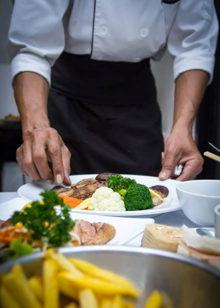 istock Chef apply  and arrange to food i 485118558