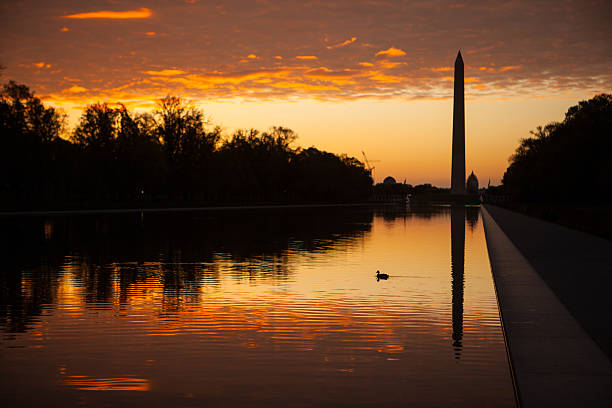 istock Silhouette and reflection of the Washington Monument at sunrise. 485119246