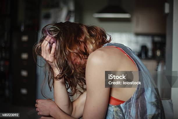 Sad Woman At Home With A Head Ache Stock Photo - Download Image Now - Beauty, One Woman Only, Only Women
