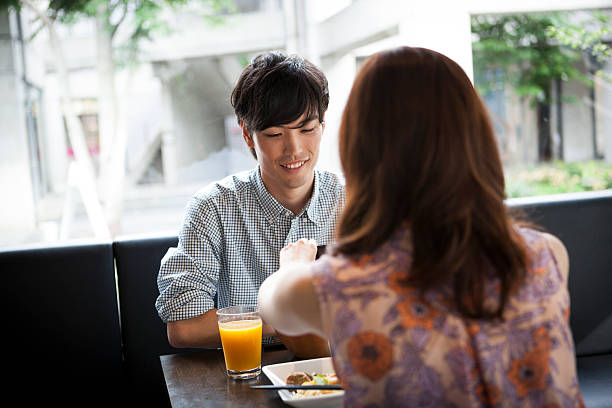 istock Charming asian man with a girl in restaurant 485124996
