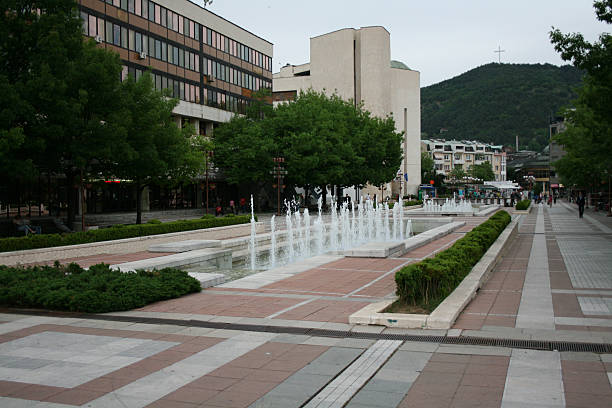 Blagoevgrad, Bulgaria The central square in Blagoevgrad, Bulgaria. In the bottom are the Theathre and cross on the hill. blagoevgrad province photos stock pictures, royalty-free photos & images