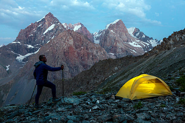 istock Hiker camping tent and mountain landscape 485130214