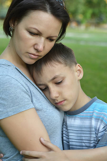 istock Mother with son in park 485131498