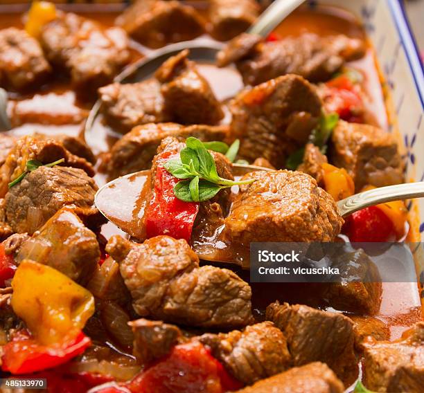 Beef Goulash With Vegetables And Spoon Close Up Stock Photo - Download Image Now - 2015, Beef, Beef Stew