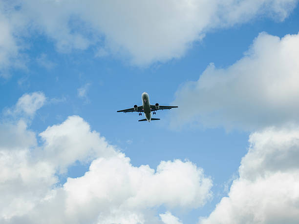 istock Commercial Airplane On Blue Sky With White Clouds 485135678