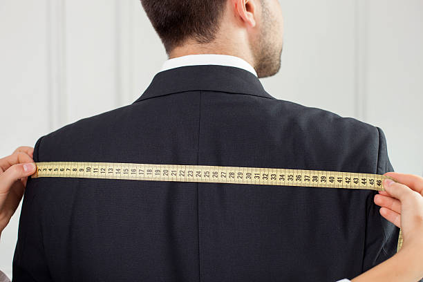 istock Successful young sewer is measuring a human body 485140248