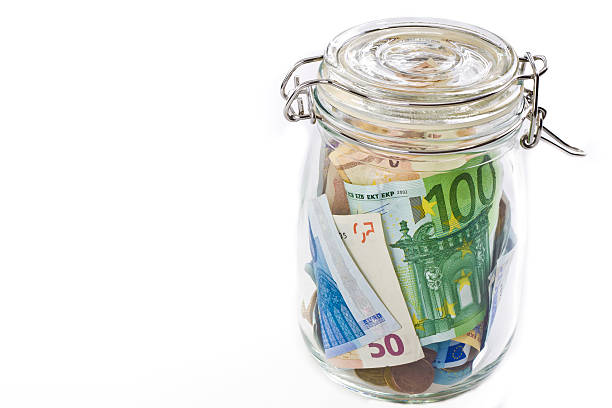 istock euro banknotes in jar isolated on white background 485150580