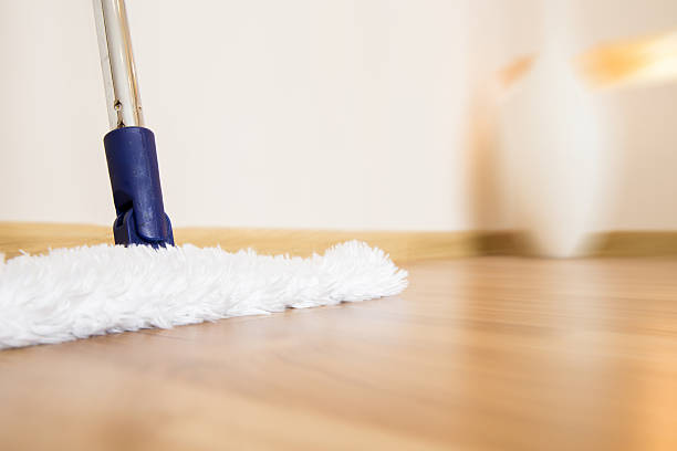 Mop Modern white mop cleaning wooden floor from dust sweeping photos stock pictures, royalty-free photos & images