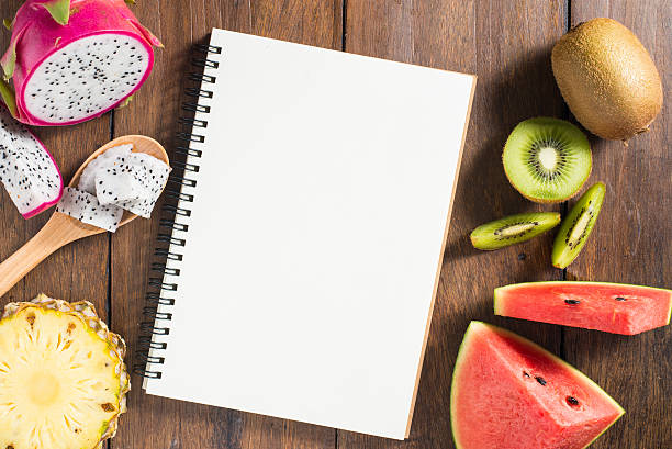 istock Recipe notebook, dragon fruit, kiwi, watermelon, Pineapple 485160778