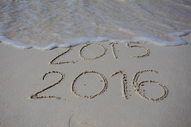 istock Numbers 2016 on beach - concept holiday background 485164050