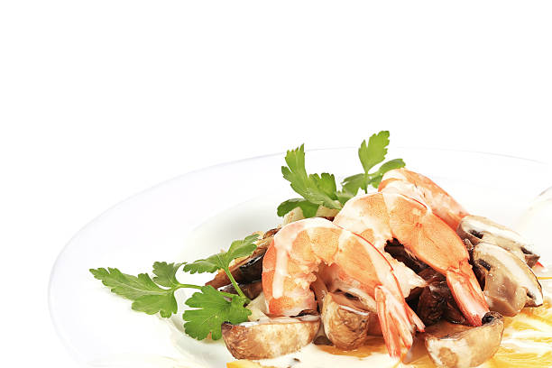 istock Shrimp salad with mushrooms and white sauce. 485164411