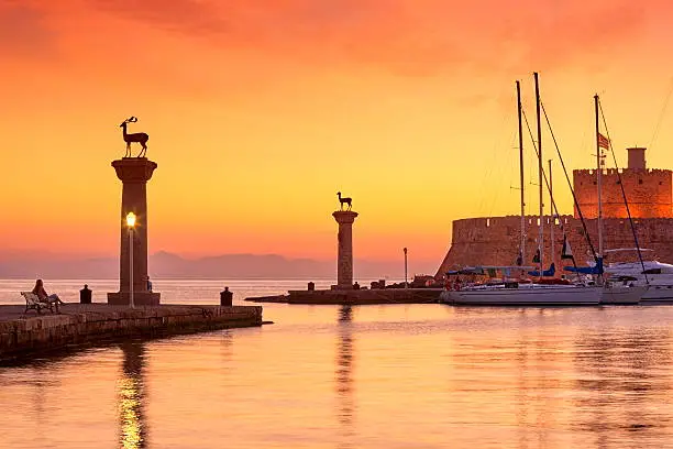 Mandraki harbor, Rhodes Island, GreeceMandraki harbor before sunrise, Rhodes Island, Greece