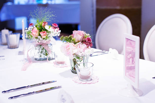 istock Table set in pink and white for wedding or event 485165420