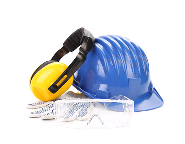 istock Blue safety helmet with earphones and goggles. 485167355