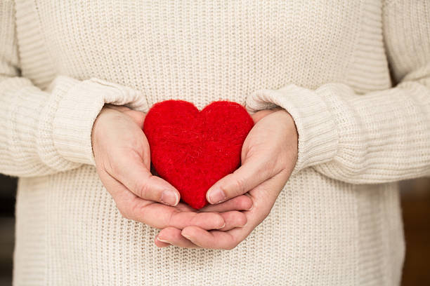 istock Red Valentines Day Heart in Woman's Hands 485168537