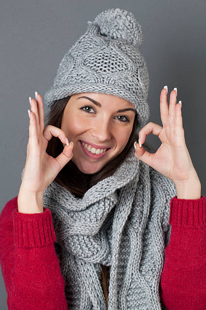 istock winter 20s girl expressing her ok with excitement 485175380