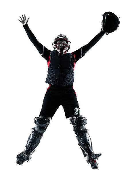 istock woman playing softball players silhouette isolated 485190058