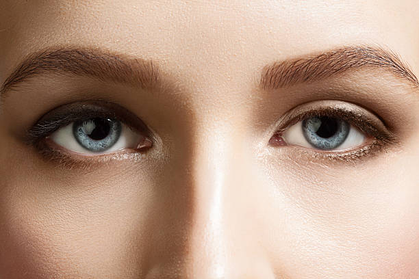 istock Blue eyes woman with brown eyebrows 485190250