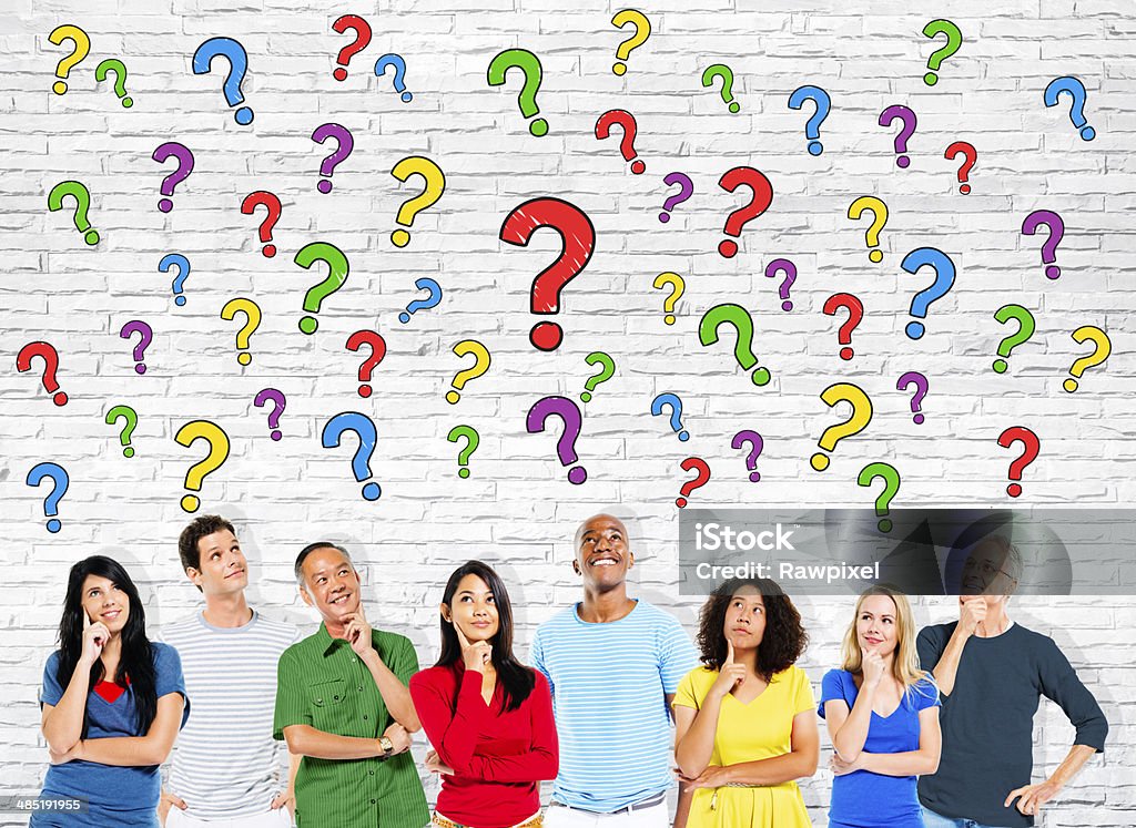 Group of People Looking Up with Question Marks Group Of Multi-Ethnic Casual People Looking Up At The Question Marks Adult Stock Photo