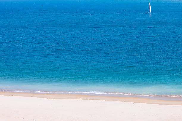 istock Sea, beach and sailboat 485192175