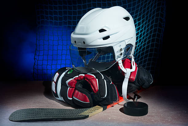 istock Hockey gear on ice 485193145
