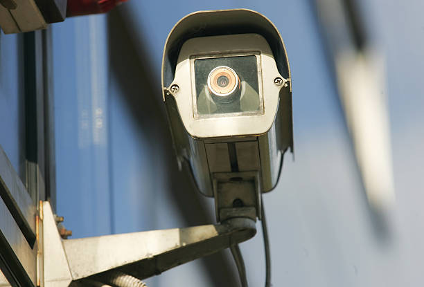 istock Security camera on the side of an modern building 485193564