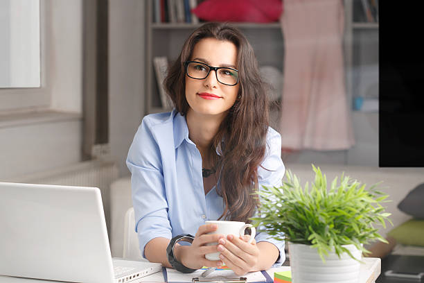 istock Young businesswoman working at home 485194699