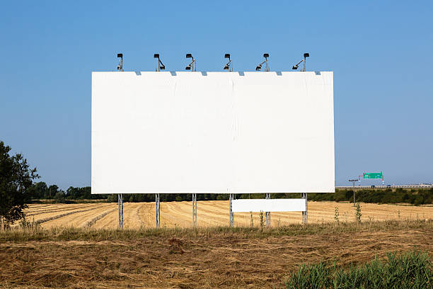 istock Bigboard and field after harvest 485196283