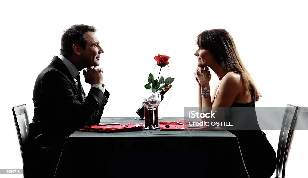 couples lovers dating dinner silhouettes couples lovers dinning in silhouettes on white background 2015 Stock Photo