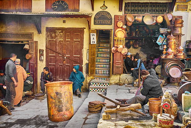 Fez, Morocco - February 24, 2015: Metalworkers workshops in the Place el Seffarine, Fez Medina, Morocco 