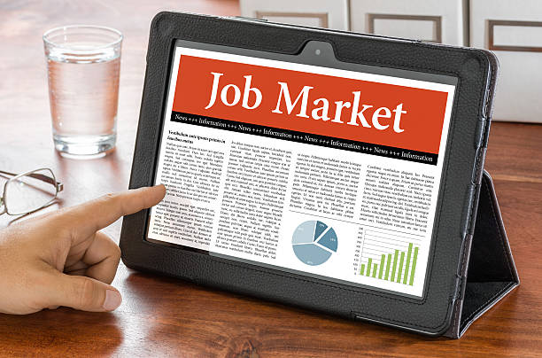 istock Tablet computer on a desk - Job Market 485205102