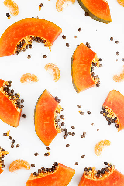 istock Papaya and mandarine fruit background 485205182