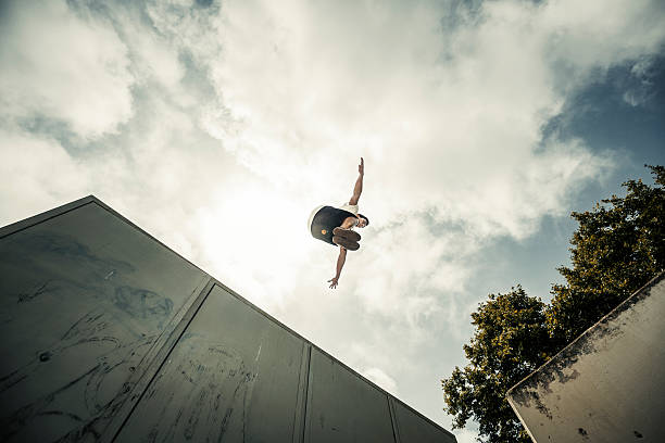 Young man practicing parkour in the city