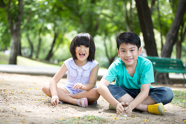 istock Little Asian child playing sand in the park 485231204
