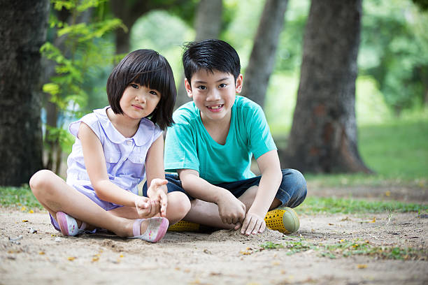 istock Little Asian child playing sand in the park 485231220