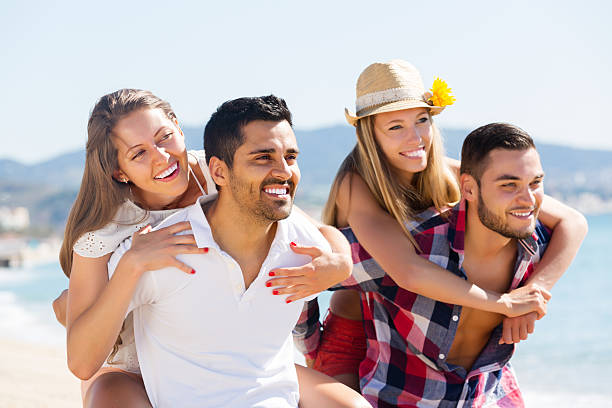 istock Young happy couple playing volleyball 485231896