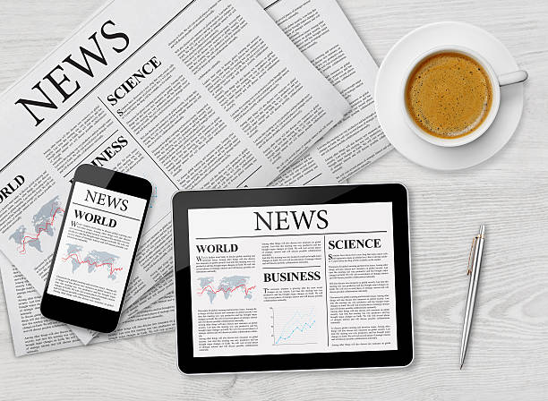 istock News page on tablet, mobile phone and newspaper 485232914