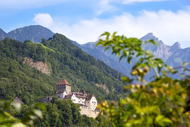 View to Vaduz, Liechtenstein in the European Alps. The most prominent landmark of Vaduz is Vaduz Castle, the home of the reigning prince of Liechtenstein and the Liechtenstein princely family.