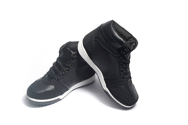 sneakers new trend, black color high top sneakers on white background high tops stock pictures, royalty-free photos & images